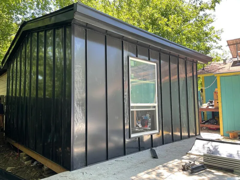 Black standing seam metal wall panels for Roof Inspection in Cornelia